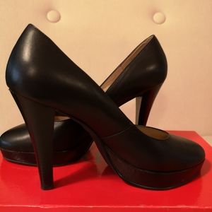 Black leather shoes heels